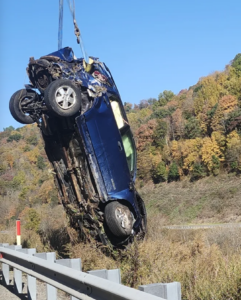 Firefighters pull woman, car back over embankment after crash near Trout Run